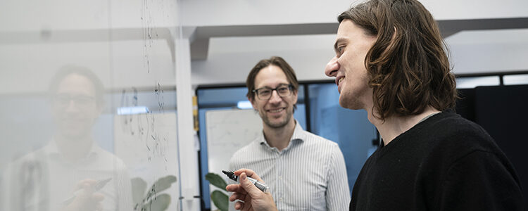 Marek Miller & Mathias Christiandl working out quantum simulations in Innovation District Copenhagen
